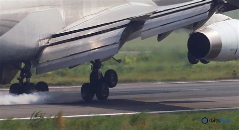 Boeing 787-10 Dreamliner rotating for takeoff with extended landing gear