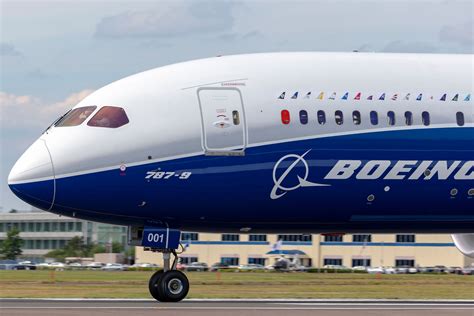Boeing 787-9 Dreamliner long haul route with large dimmable windows and composite airframe