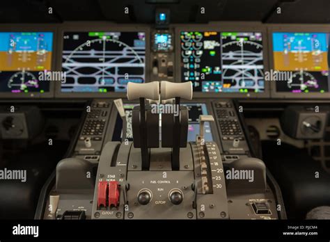Boeing 787 cockpit flight deck with advanced avionics displays during long haul cruise