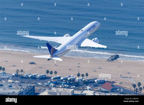 Boeing 787 Dreamliner taking off with flexed wings and composite fuselage detail