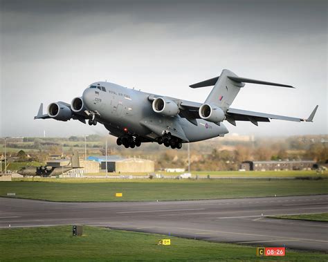 Boeing C-17 Globemaster III military cargo aircraft operating on a runway during a strategic airlift mission