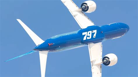 Boeing CEO and engineers unveiling concept model of the 797 at an industry event