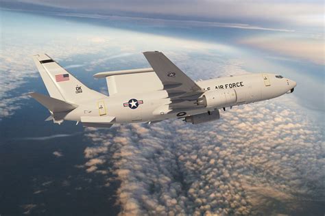 Boeing E-3 Sentry AWACS with radar dome conducting airspace control mission
