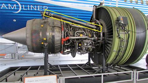 Boeing engineering team inspecting 777X thrust link assembly at Everett plant