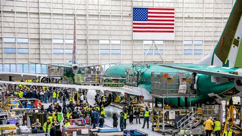 Boeing engineers performing final inspection before 737 MAX delivery in Renton, Washington