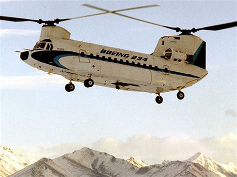 boeing vertol 234 chinook hauling equipment over Alaskan tundra