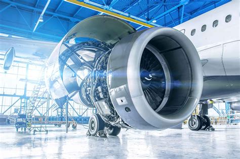 Boeing widebody aircraft structural modification hangar engineers at work