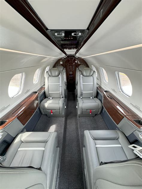 Bossa Nova Edition interior of the Phenom 300E with quilted leather and carbon fiber finishes