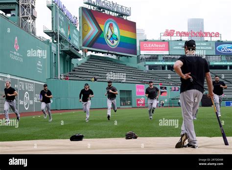 Boston skyline adorned with Pride lights during OUTLOUD weekend