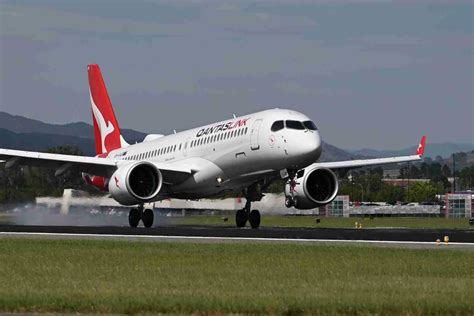 Brand new Airbus A220-300 in QantasLink livery at delivery ceremony in Toulouse, France