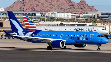 Breeze Airways Airbus A220-300 departing Florida airport during September travel season