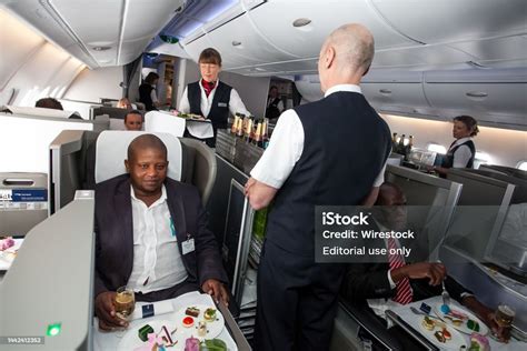 british airways cabin crew serving business class on short haul winter route