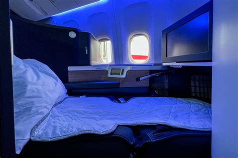 British Airways Club World flat bed with The White Company bedding