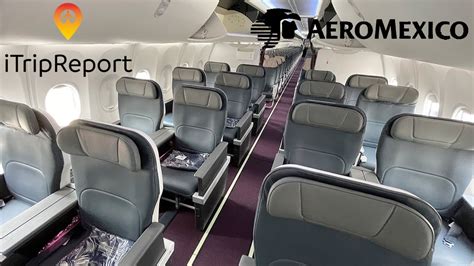 Business passenger using Wi-Fi in an Aeroméxico Embraer E190