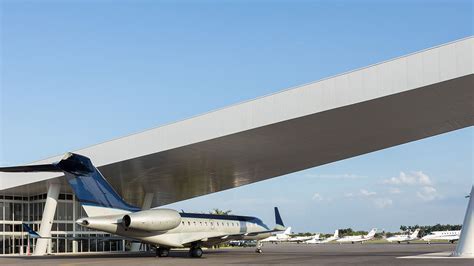 bustling apron with business jets in Opa-locka Airport Florida