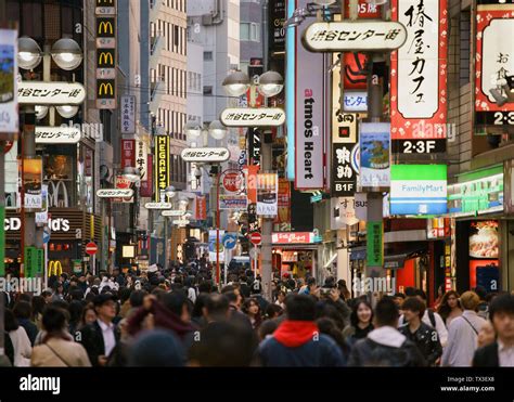 bustling streets of Tokyo with international tourists