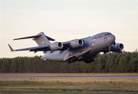 C-17 Globemaster III performing short-field landing in rugged terrain