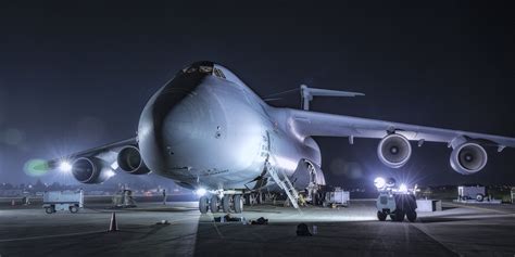 C-5M Super Galaxy flying at sunset heavy cargo military airlift