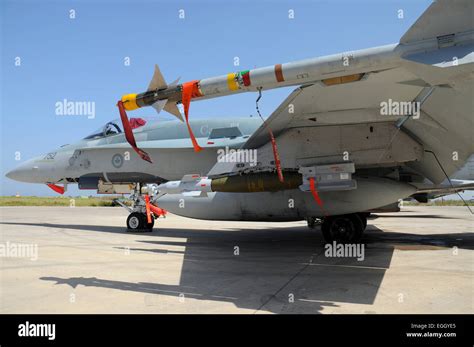 Canadian CF-18 Hornet loaded with precision-guided bombs during NATO Libya operation
