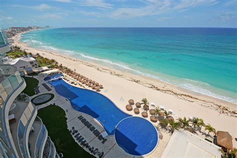 Cancun beachfront with resort security in the background