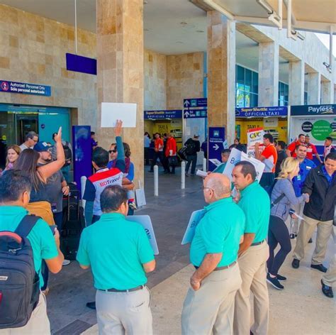 Cancun International Airport arrivals area with leisure travelers