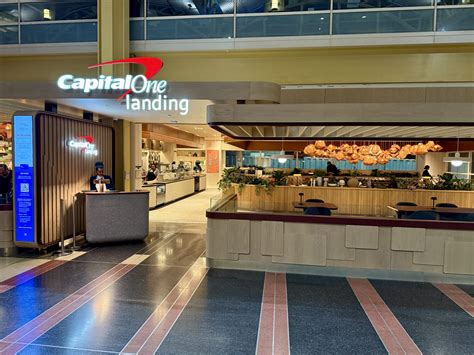 Capital One Landing Lounge interior with view of tarmac at DCA