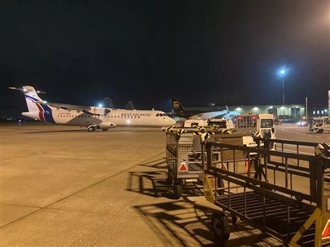cargo aircraft at east midlands airport loading during night