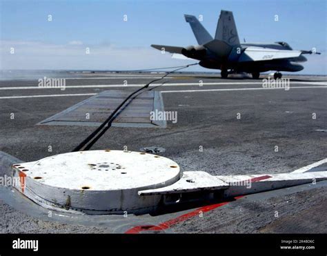 Carrier landing arresting wire system capturing F-18