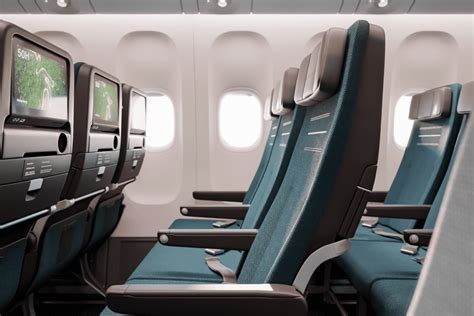 Cathay Dragon cabin interior with refurbished seats and AVOD screens