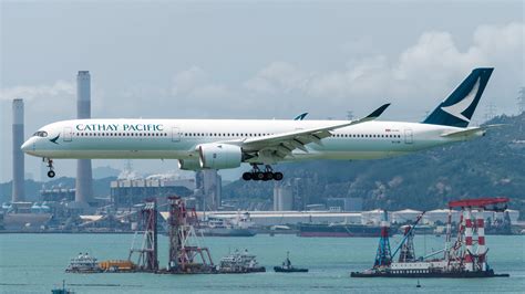 cathay pacific a350-1000 on final approach at dfw international airport