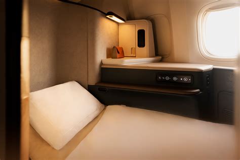 Cathay Pacific Aria Suite cabin with sliding doors and ambient mood lighting