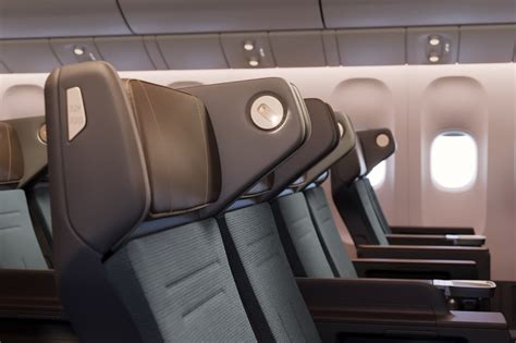 Cathay Pacific Boeing 777 premium economy privacy headrest wings