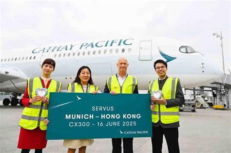 cathay pacific crew celebrating munich route launch at hong kong international airport