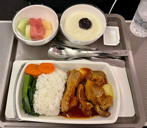 Cathay Pacific economy meal dim sum milk tea tray inflight