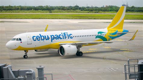 Cebu Pacific aircraft taxiing at Manila Airport, highlighting its role as a Philippine aviation leader