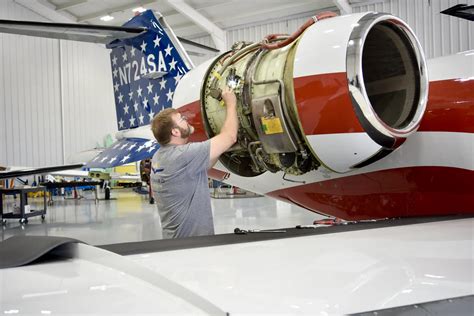certified A&P mechanic conducting jet engine diagnostics in San Francisco hangar