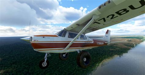 cessna 172 classic on grass strip with rural background