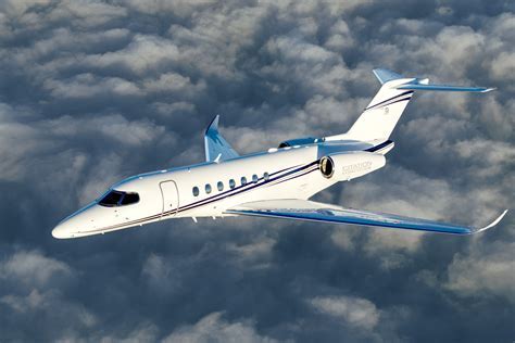 Cessna Citation Longitude flying over cityscape at high altitude