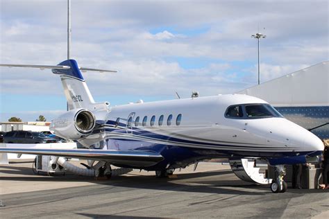 cessna citation longitude on ramp with boarding stairs lowered