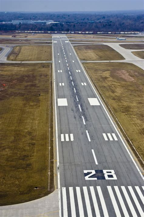 cessna trainer preparing touch-and-go on dry paved runway