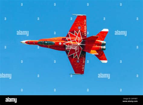 CF-18 Hornet performing high-speed maneuver during Royal Canadian Air Force demonstration