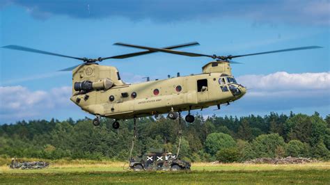 CH-47 Chinook helicopter lifting cargo during training operations in Maryland