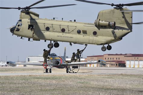 CH-47F performing multi-load sling operations during joint NATO exercise