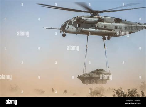 CH-53E Super Stallion lifting a Humvee during amphibious training exercise