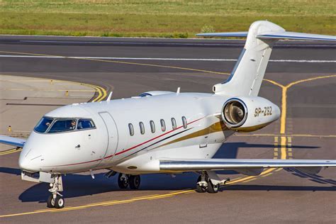 challenger 300 jet on runway before takeoff