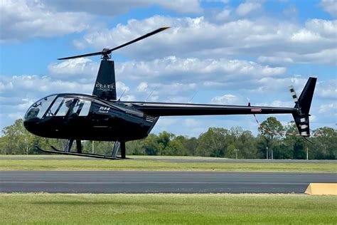 Charlotte Helicopters Robinson R44 preparing for takeoff in Waxhaw