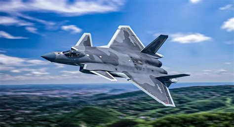 Chengdu J-20 Mighty Dragon stealth fighter of the PLAAF flying over mountain terrain