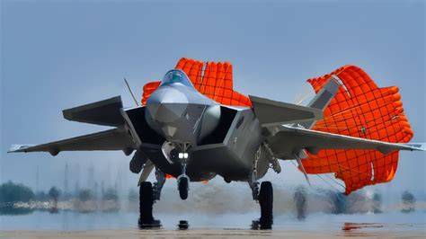 Chengdu J-20 stealth fighter in flight over coastal region