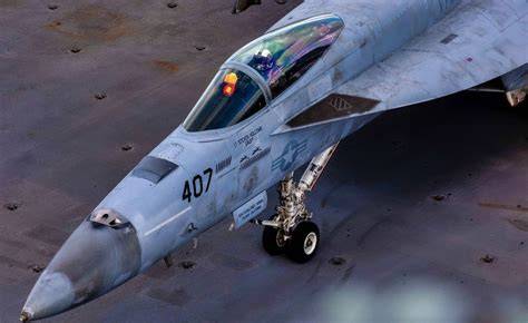 China Lake Mojave Desert test range with an F/A-18 Super Hornet carrying a Sidewinder missile