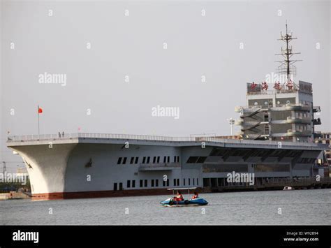 Chinese aircraft carrier Shandong sailing with escort ships, 2023
